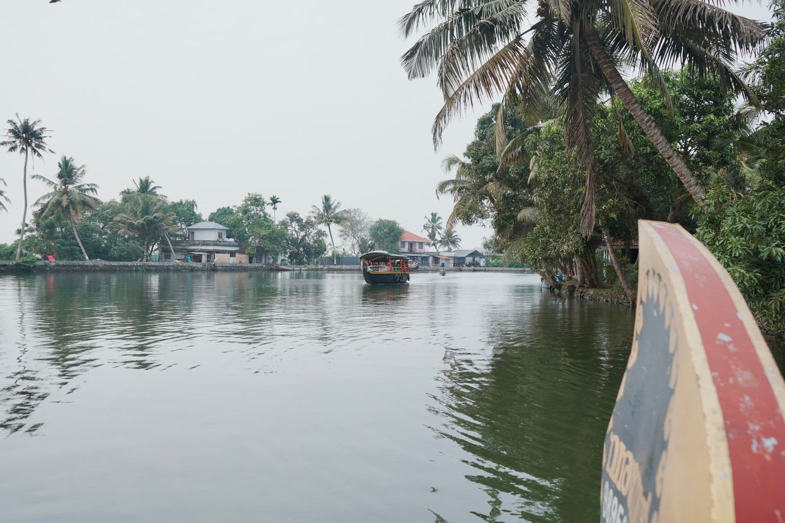 A houseboat on the palm-lined backwaters of Kerala